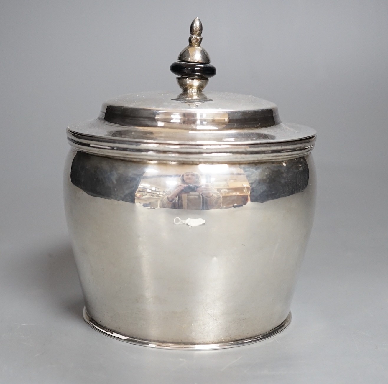 A 20th century continental white metal circular pot and cover, with pseudo marks, height 13cm, gross weight 12 oz.